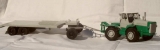Т-125 трактор + полуприцепом-тяжеловоз с подкатной тележкой ЧМЗАП-5523