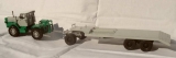 Т-125 трактор + полуприцепом-тяжеловоз с подкатной тележкой ЧМЗАП-5523